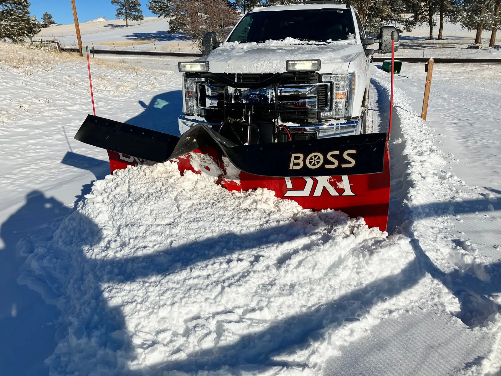 Snow plow on a driveway